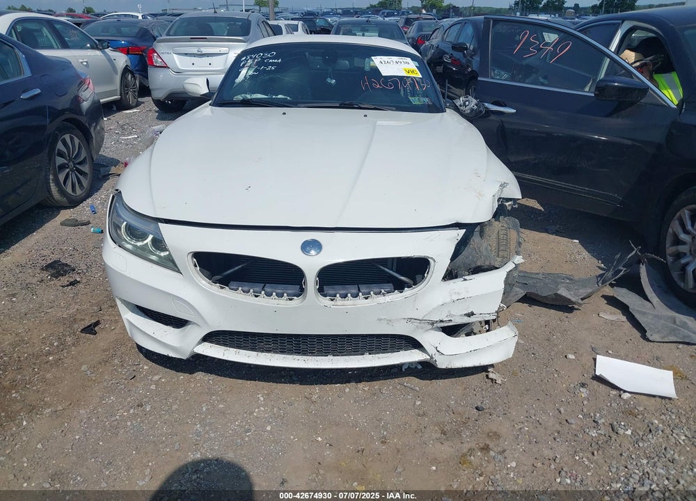 2014 BMW Z4 VIN: WBALM7C50EE386377