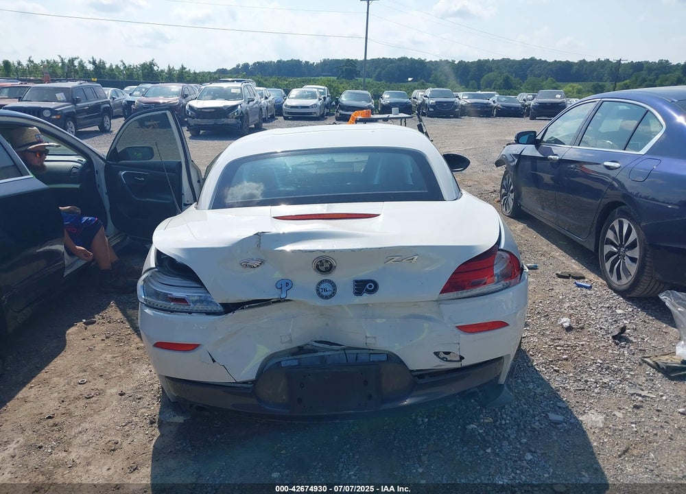 2014 BMW Z4 VIN: WBALM7C50EE386377