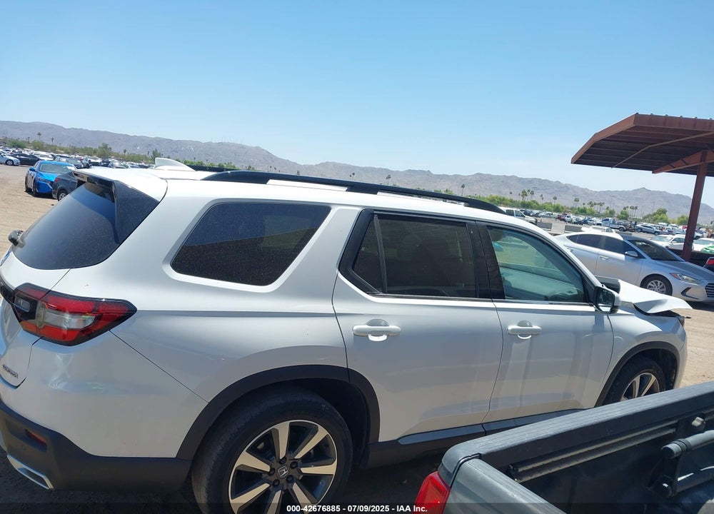 2023 HONDA PILOT 2WD TOURING VIN: 5FNYG2H70PB002497