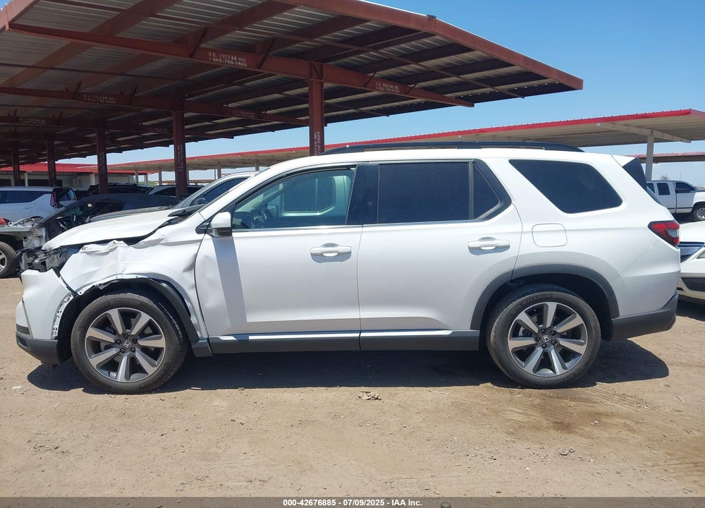 2023 HONDA PILOT 2WD TOURING VIN: 5FNYG2H70PB002497