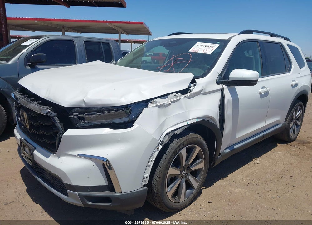 2023 HONDA PILOT 2WD TOURING VIN: 5FNYG2H70PB002497