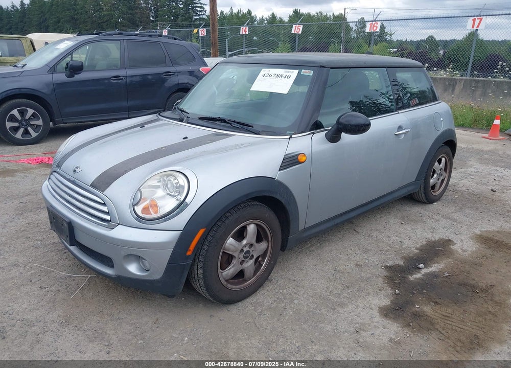 2007 MINI COOPER VIN: WMWMF33557TU61953