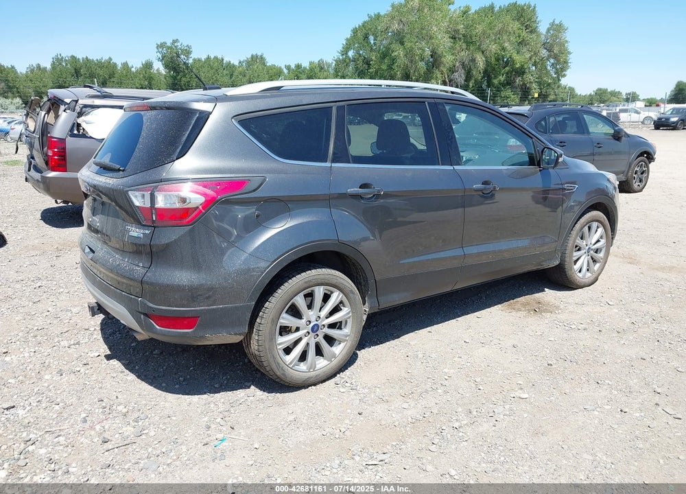 2017 FORD ESCAPE TITANIUM VIN: 1FMCU9J93HUB61610