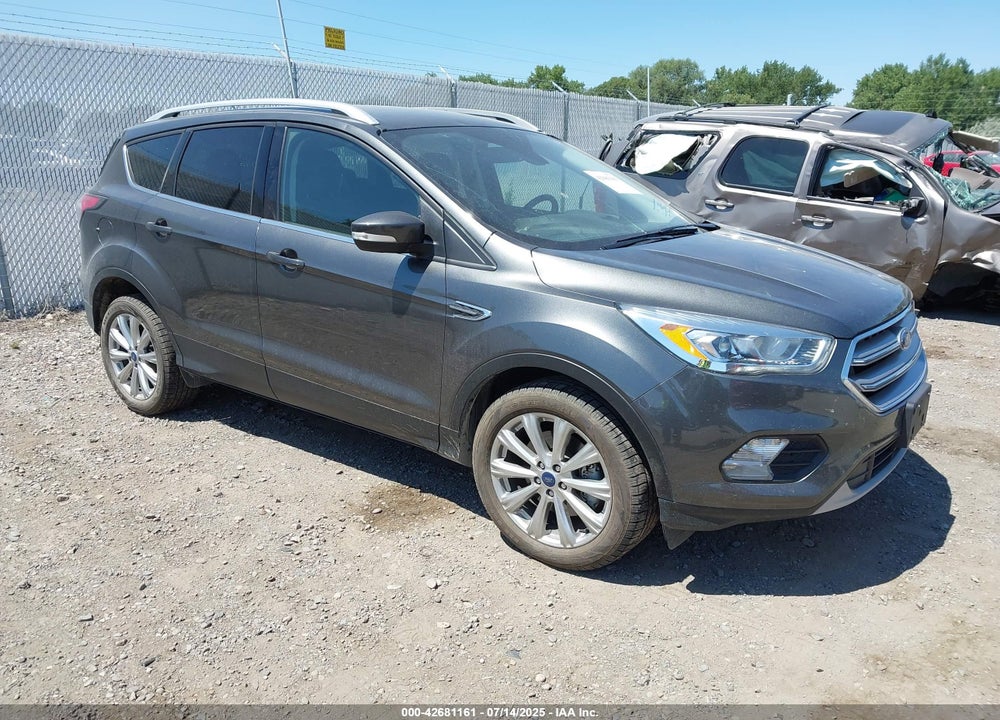 2017 FORD ESCAPE TITANIUM VIN: 1FMCU9J93HUB61610