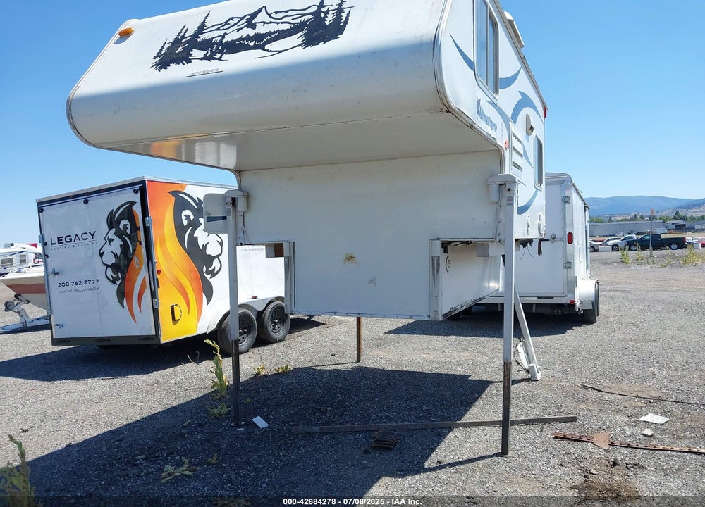 2011 ADVENTURER TRUCK BED CAMPER VIN: 15777