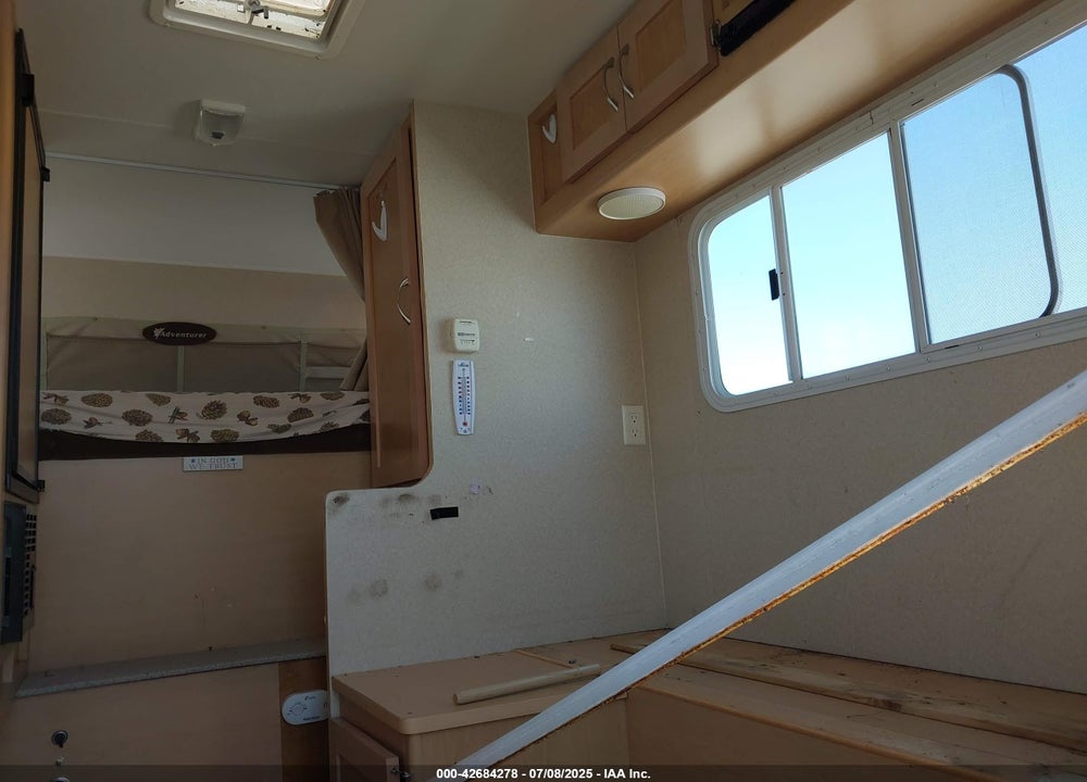2011 ADVENTURER TRUCK BED CAMPER VIN: 15777