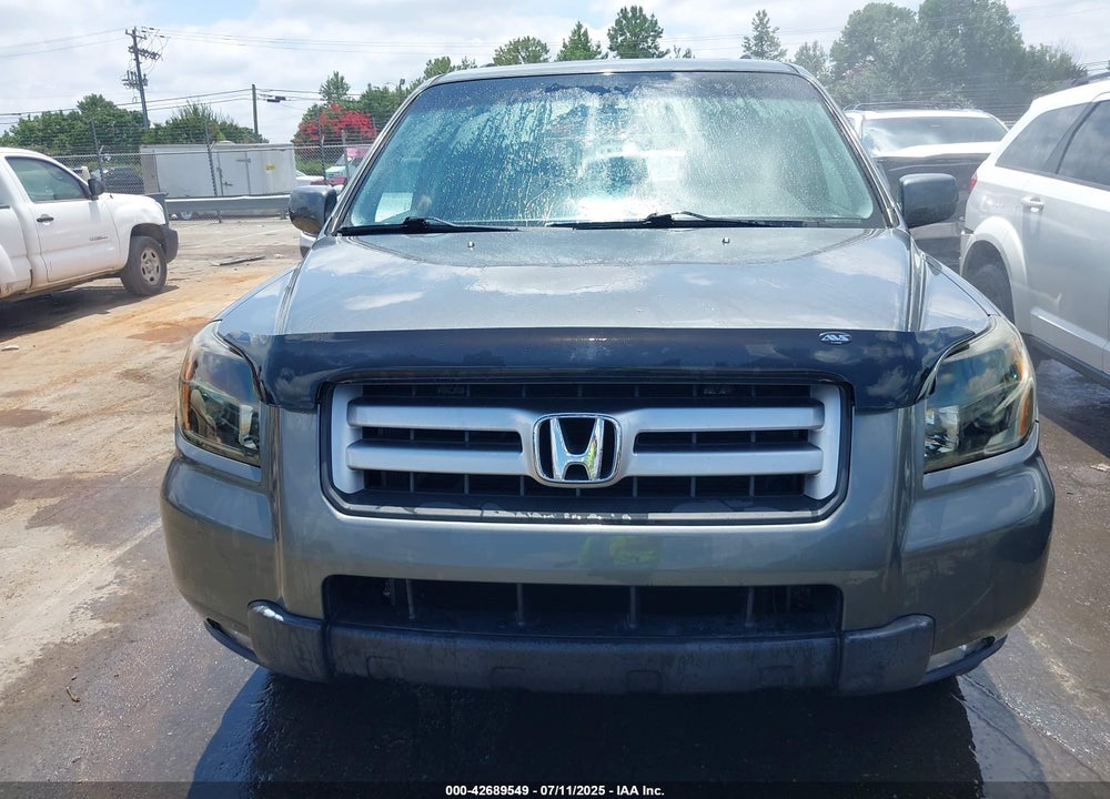 2007 HONDA PILOT EX-L VIN: 5FNYF28527B005645