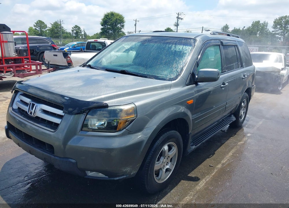 2007 HONDA PILOT EX-L VIN: 5FNYF28527B005645