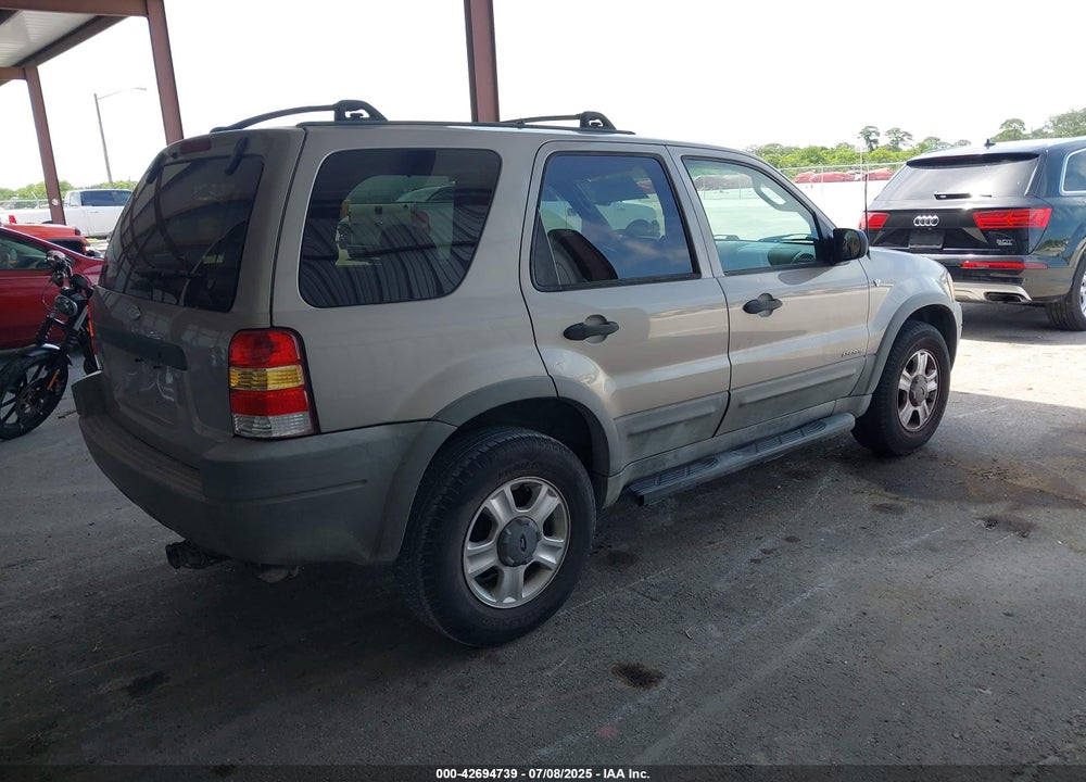 2001 FORD ESCAPE XLT VIN: 1FMYU03111KF57142