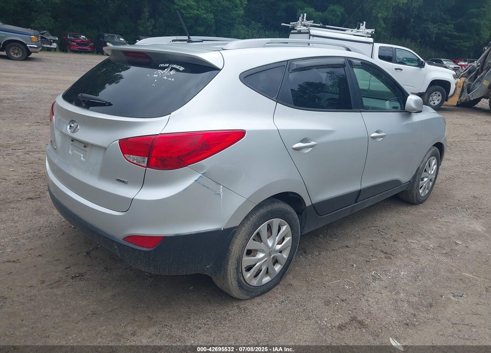 2014 HYUNDAI TUCSON VIN: KM8JUCAG4EU910039