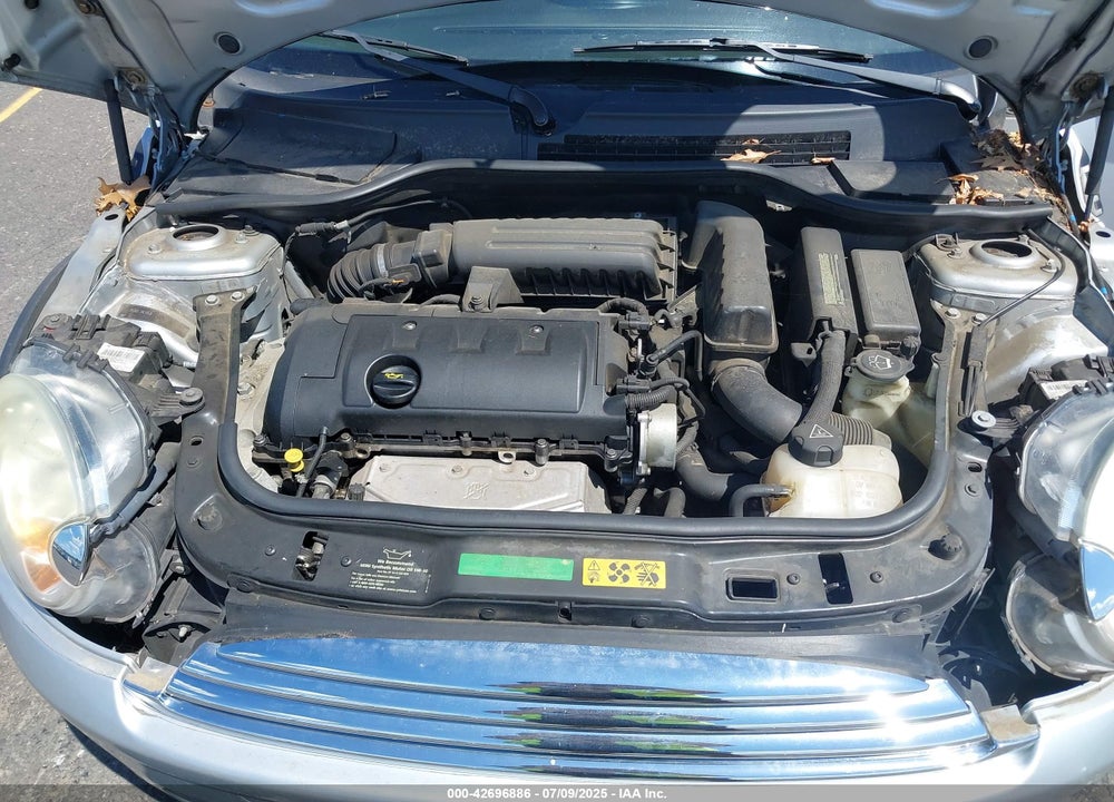 2009 MINI COOPER VIN: WMWMF335X9TU71767
