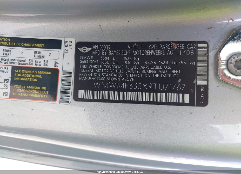 2009 MINI COOPER VIN: WMWMF335X9TU71767