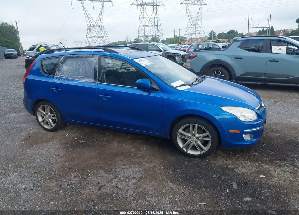 2010 HYUNDAI ELANTRA TOURING VIN: KMHDC8AE9AU083239