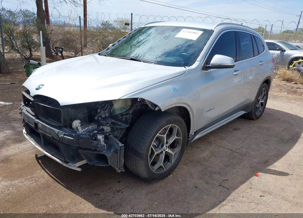 2017 BMW X1 VIN: WBXHU7C3XH5H33232