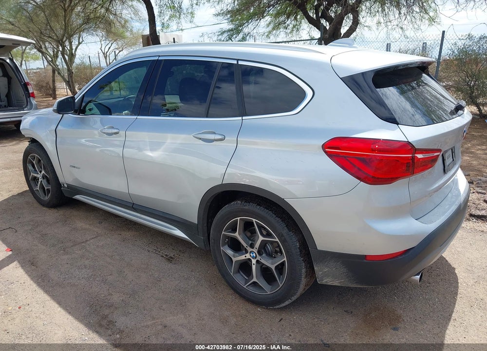 2017 BMW X1 VIN: WBXHU7C3XH5H33232