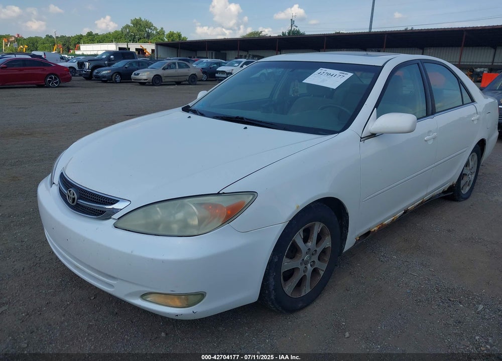 2004 TOYOTA CAMRY LE VIN: JTDBE32K740284744