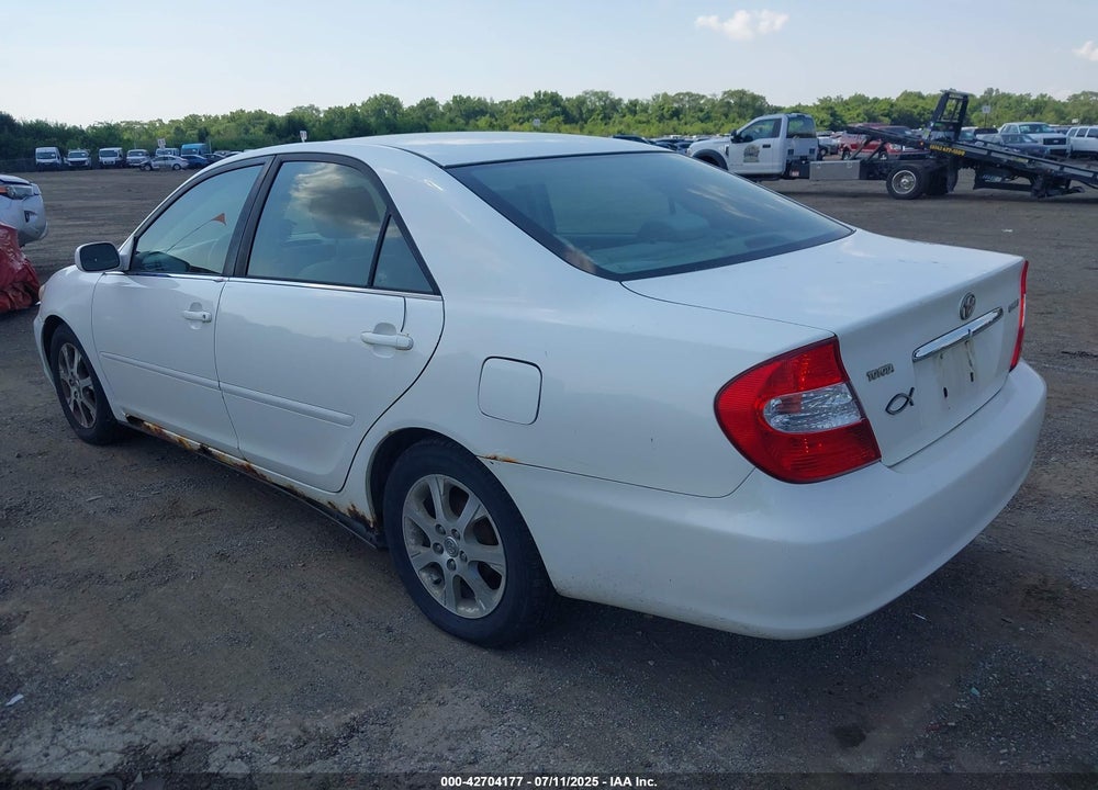 2004 TOYOTA CAMRY LE VIN: JTDBE32K740284744