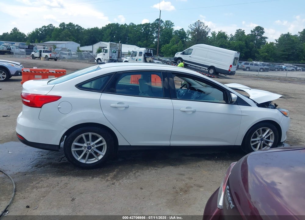 2015 FORD FOCUS VIN: 1FADP3F21FL259942