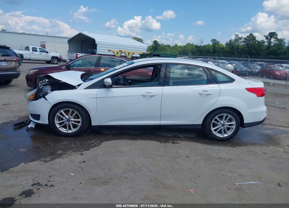 2015 FORD FOCUS VIN: 1FADP3F21FL259942