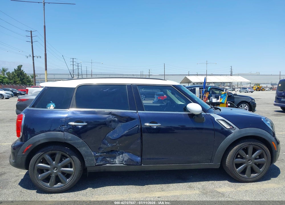 2013 MINI COOPER COUNTRYMAN VIN: WMWZC3C58DWP21061