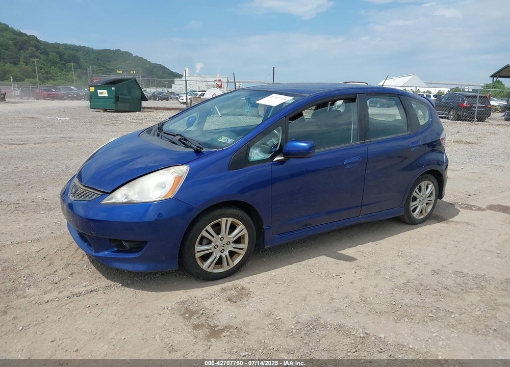 2010 HONDA FIT VIN: JHMGE8H44AS021833
