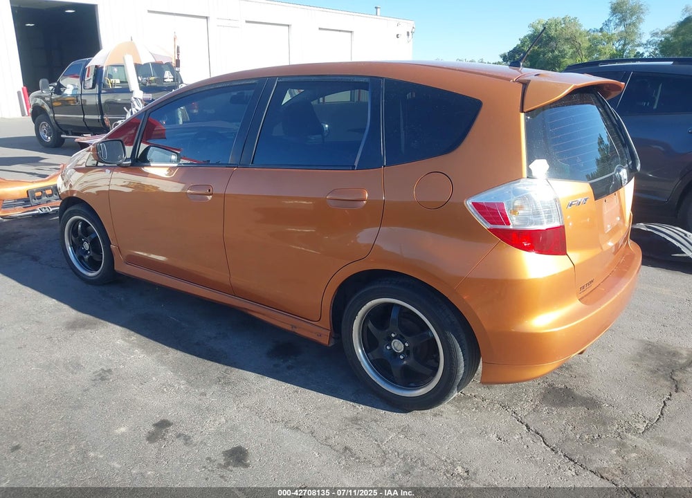 2009 HONDA FIT SPORT VIN: JHMGE88469S053131