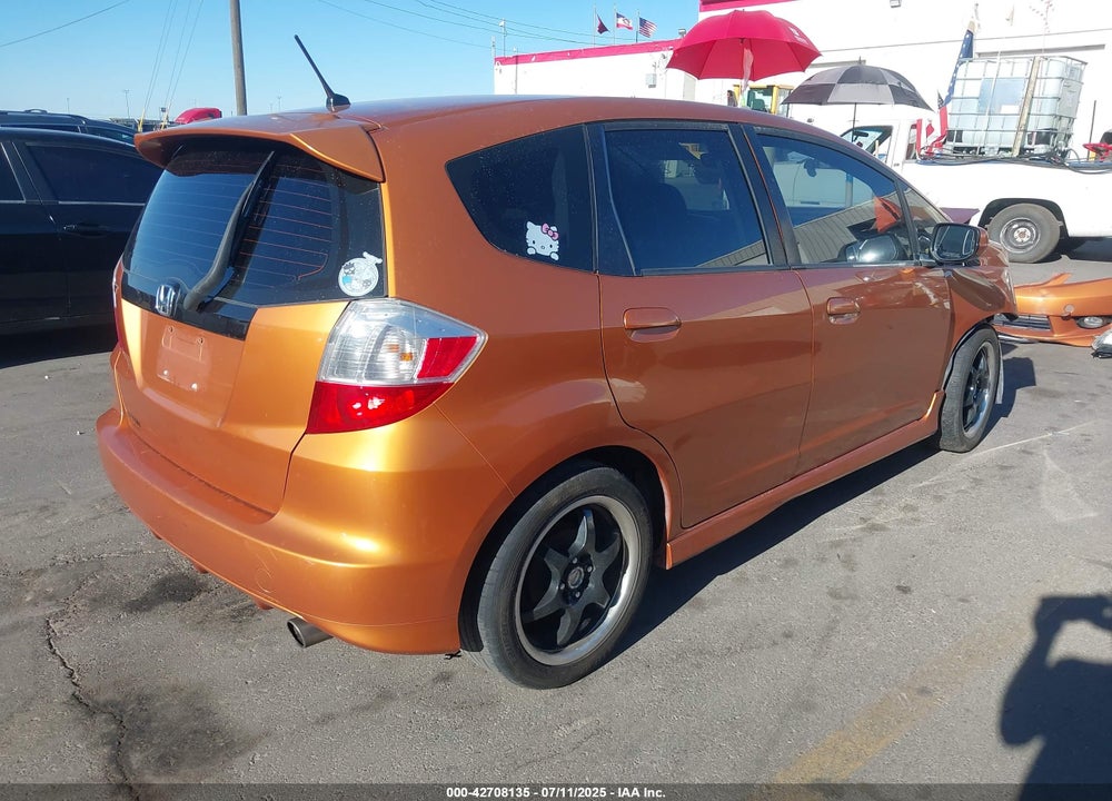 2009 HONDA FIT SPORT VIN: JHMGE88469S053131