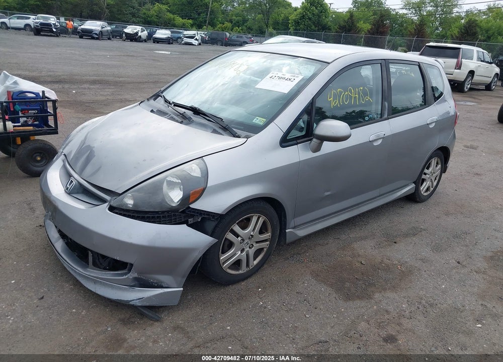 2007 HONDA FIT VIN: JHMGD38607S027483