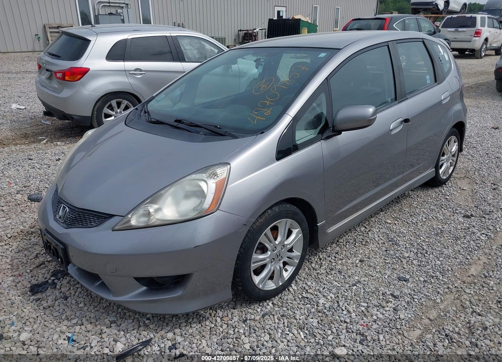 2009 HONDA FIT VIN: JHMGE88429S035547