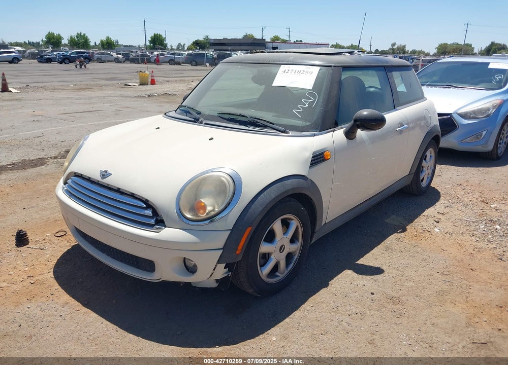 2010 MINI COOPER VIN: WMWMF3C51ATZ23464