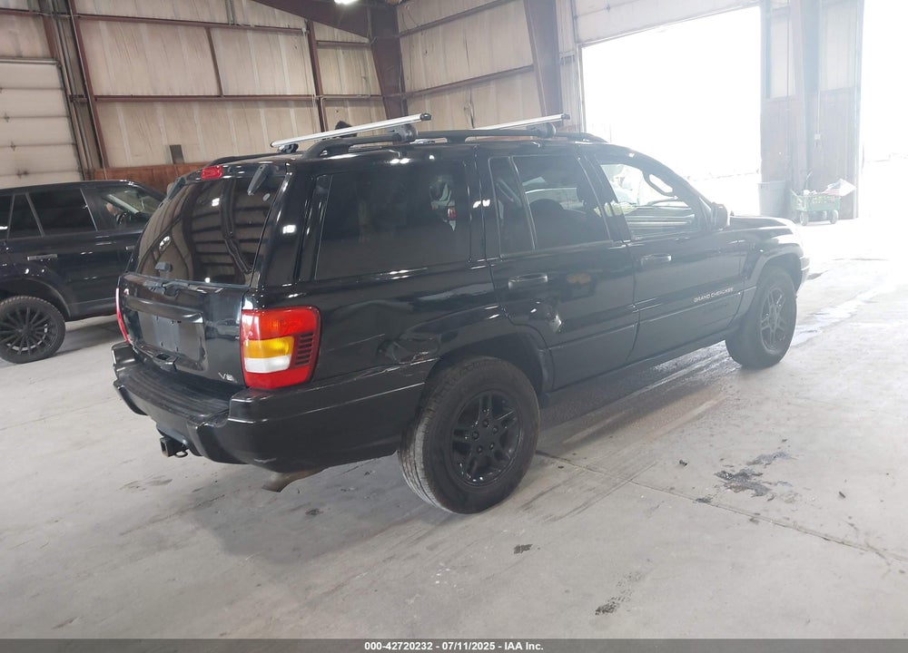 2002 JEEP GRAND CHEROKEE LAREDO VIN: 1J4GW48N42C168465