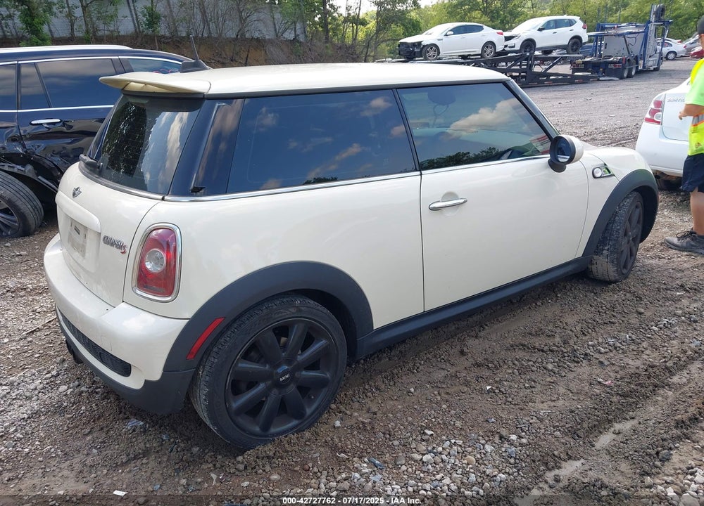 2010 MINI COOPER S VIN: WMWMF7C55ATX44898
