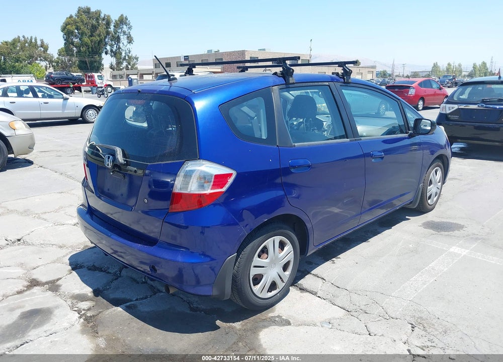 2009 HONDA FIT VIN: JHMGE88209S049235