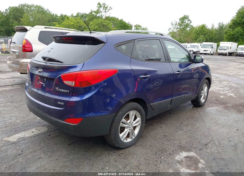 2012 HYUNDAI TUCSON VIN: KM8JUCAC5CU534185