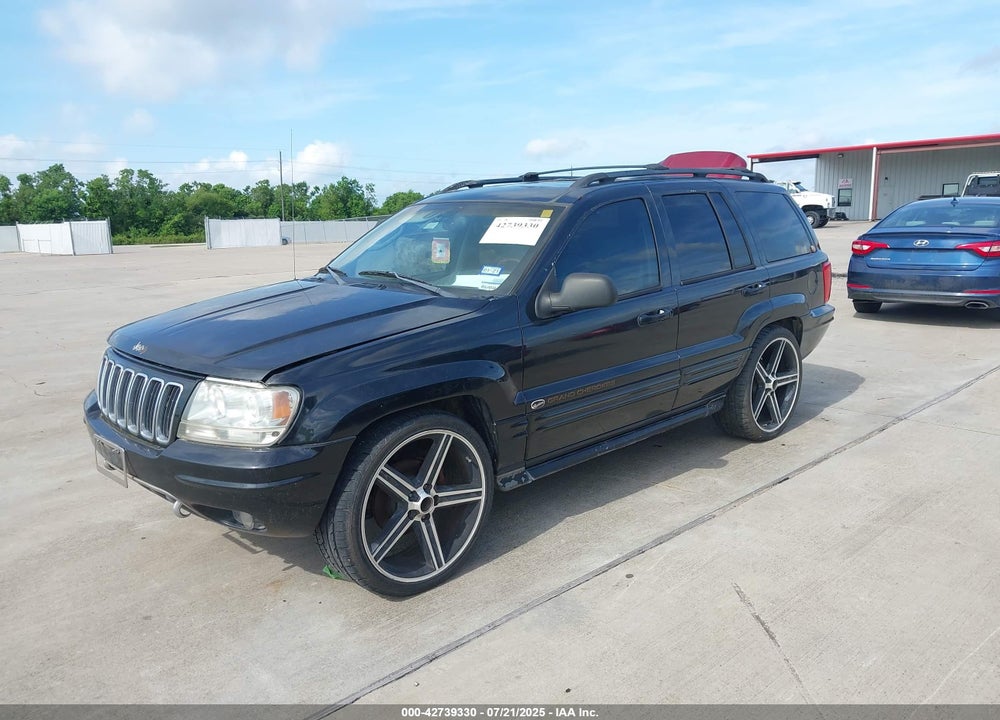 2003 JEEP GRAND CHEROKEE OVERLAND VIN: 1J8GW68J73C521872