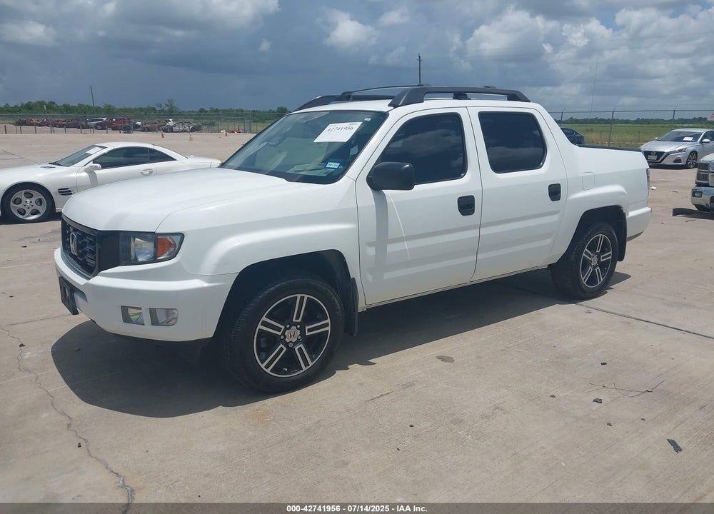 2014 HONDA RIDGELINE VIN: 5FPYK1F71EB011340