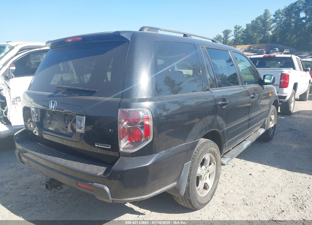 2006 HONDA PILOT EX-L VIN: 5FNYF18556B004823