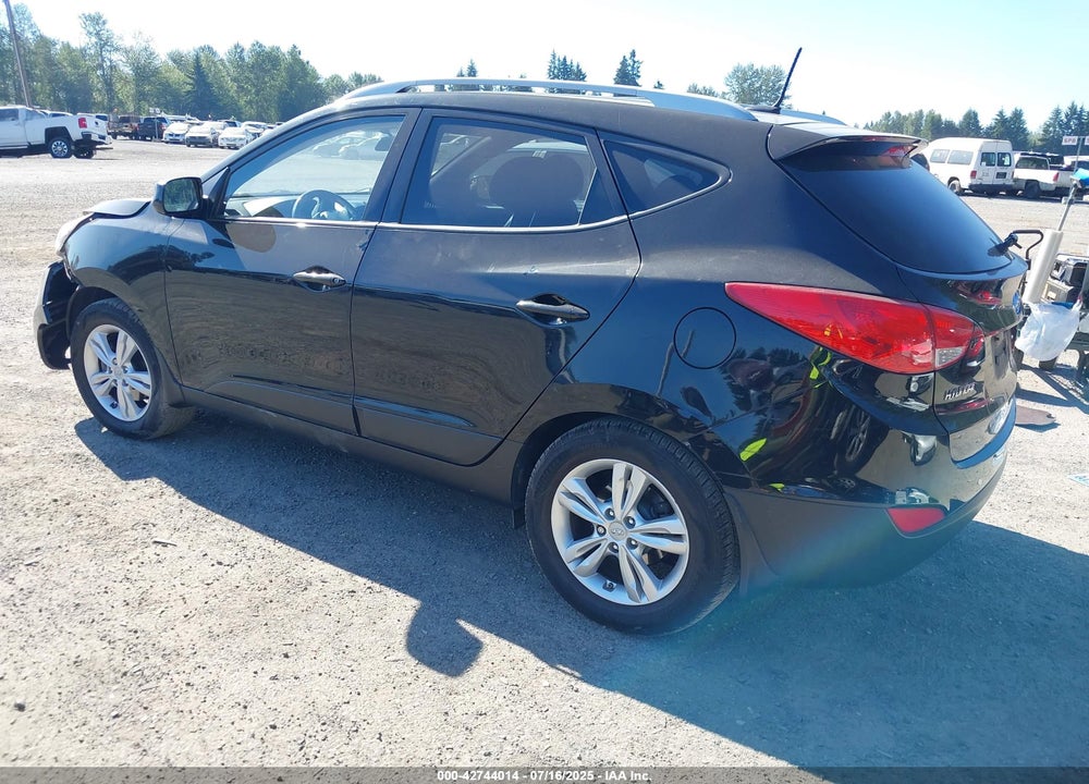 2011 HYUNDAI TUCSON VIN: KM8JUCAC8BU312870