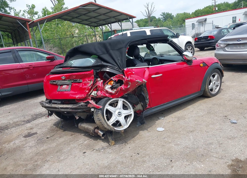 2009 MINI COOPER VIN: WMWMR33579TU95077