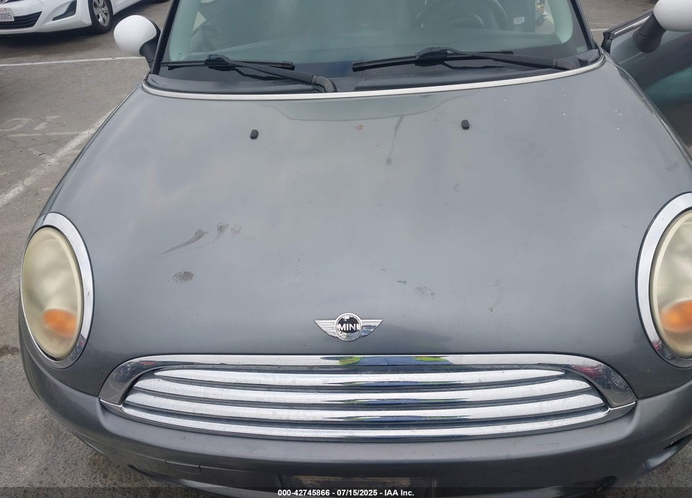 2010 MINI COOPER VIN: WMWMF3C57ATZ25476