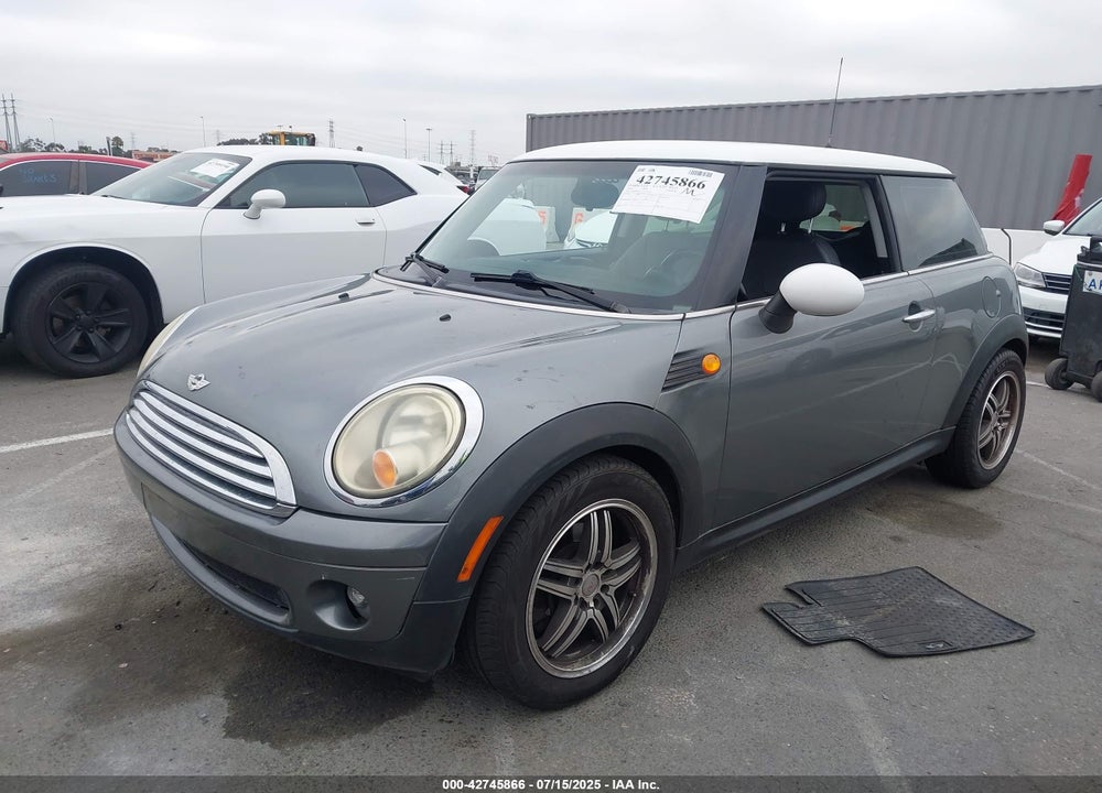 2010 MINI COOPER VIN: WMWMF3C57ATZ25476