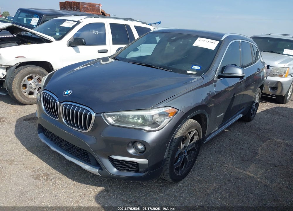 2017 BMW X1 VIN: WBXHU7C31H5H34897