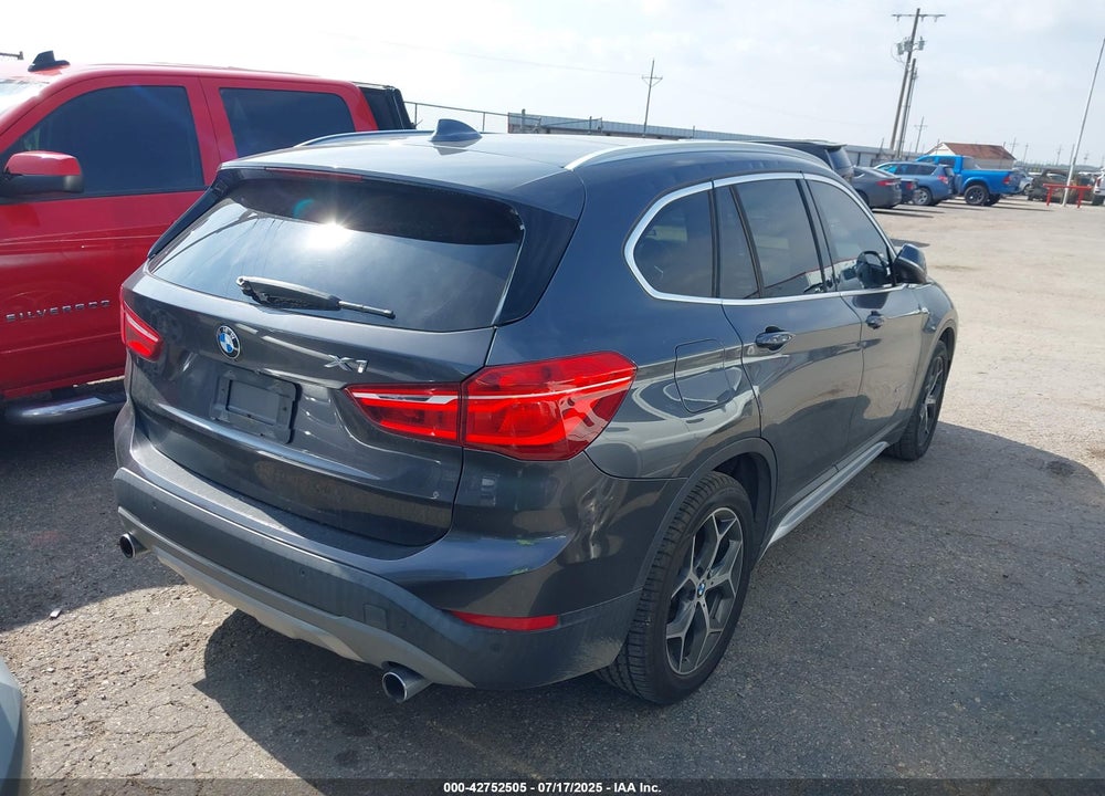2017 BMW X1 VIN: WBXHU7C31H5H34897