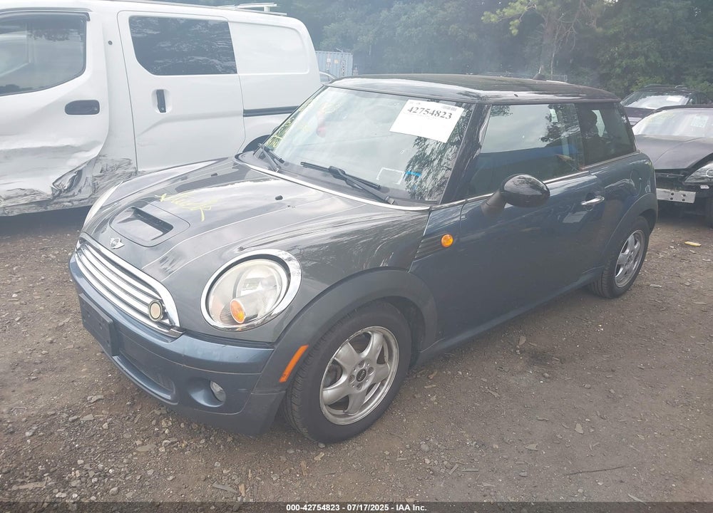 2010 MINI COOPER VIN: WMWMF3C55ATZ64356