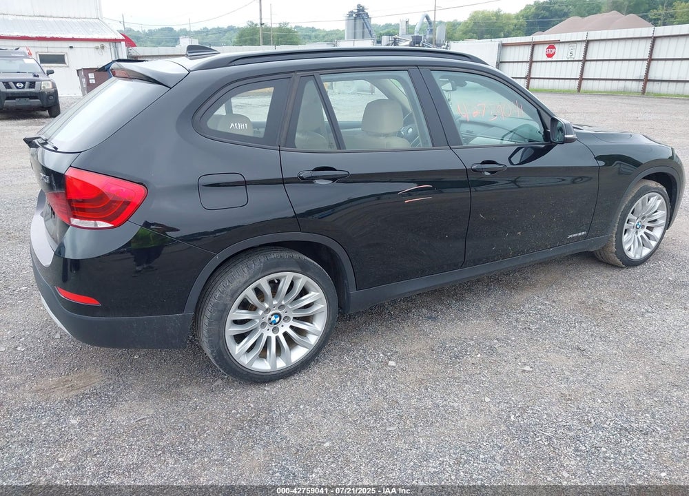 2014 BMW X1 VIN: WBAVL1C50EVY16160