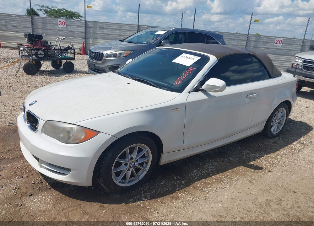 2011 BMW 128I VIN: WBAUL7C50BVM81279