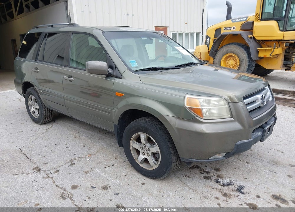 2007 HONDA PILOT EX-L VIN: 5FNYF18597B008424