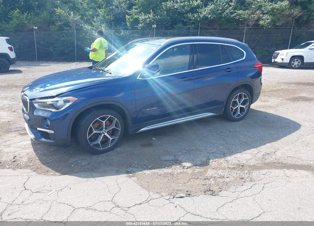 2017 BMW X1 VIN: WBXHT3C32H5F72371