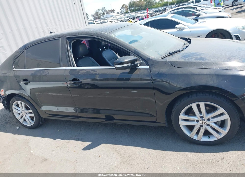 2015 VOLKSWAGEN JETTA VIN: 3VWL17AJ7FM307632