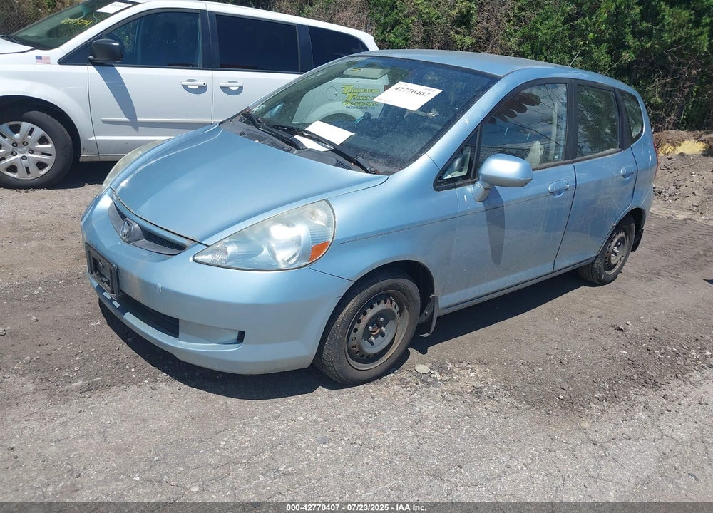 2007 HONDA FIT VIN: JHMGD38487S058706